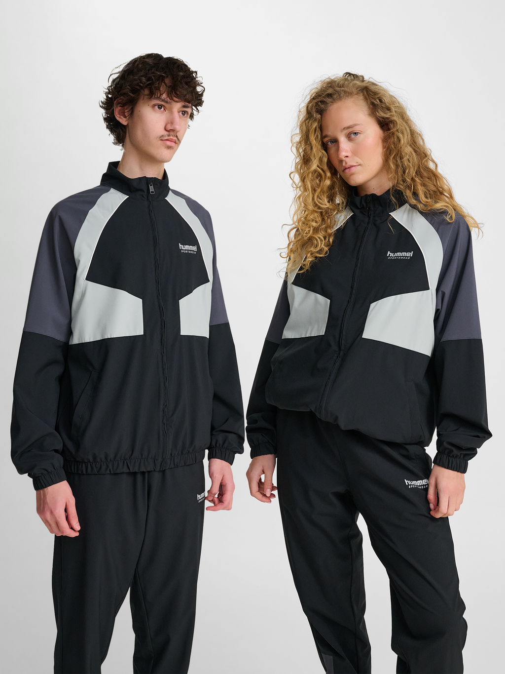 hmlLOOSE TRACK ZIPJACKET SPORTSWEAR
